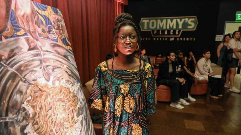 Artist Jayna Dias exhibits her work during the commemoration of Juneteenth. (Photo/Gus Ruelas)